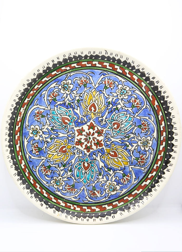 TURQUIE - PLAT DE KUTAHYA AUX MOTIFS FLORAUX ET ETHNIQUES